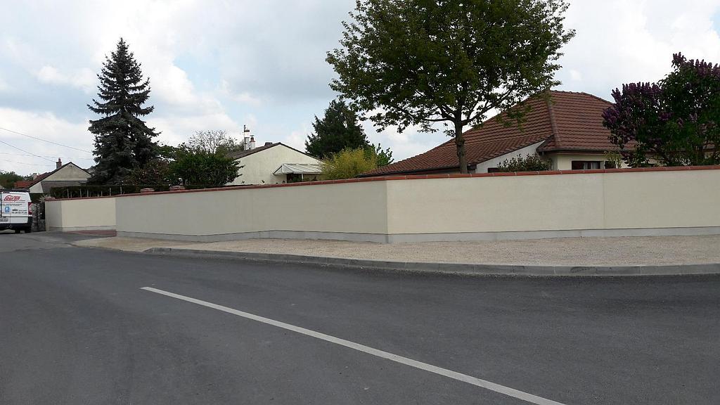 Mur de clôture, réalisation de l’entreprise Courtin